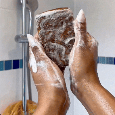 Applying body wash with hands